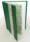 Bookbinding made special with endpapers and decorative strip on the front cover